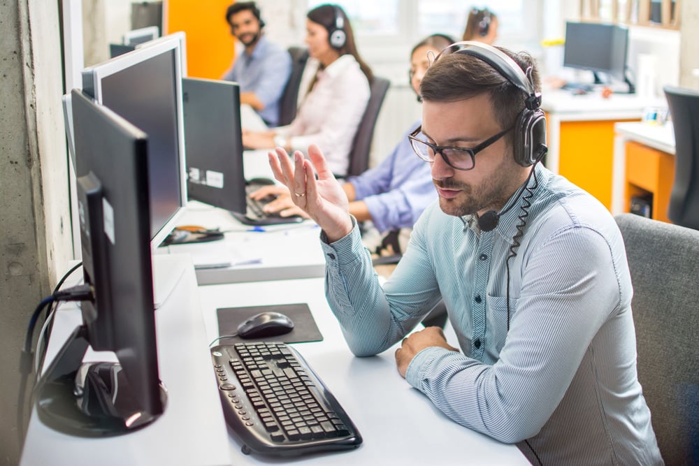stock-photo-hotline-and-helpdesk-support-operator-working-in-office-1691197141